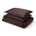 Close-up of dark chocolate brown organic cotton fabric texture